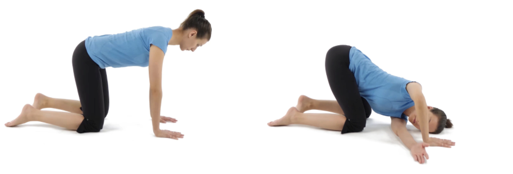 A woman doing a thread the needle exercise 